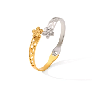 Bracelet jonc en acier inoxydable bicolore avec motif de fleur ajourée or et argent