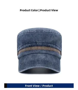 Front detail of washed blue cotton flat top cap with brown faux leather strap and buttons