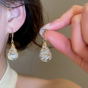 Handmade dried flower resin teardrop earrings with elegant gold hook details