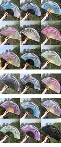 Collection of 18 Chinese silk folding fans with bamboo ribs and artistic ink painting