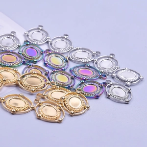 Oval stainless steel pendant trays with beaded edges in gold, silver and rainbow colors