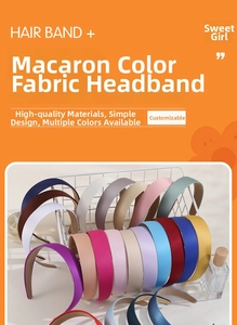 Detail of colorful macaron fabric headbands displayed on a white grid shelf
