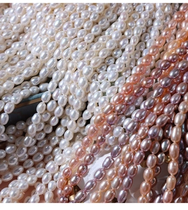 Macro shot of 5-6mm natural freshwater rice pearls in white and mixed pastel colors