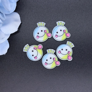Macro detail of aurora five-pointed star resin accessories for DIY phone cases and crafts