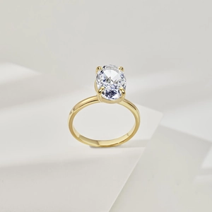 Detailed macro view of S925 silver gold ring with oval ice-flower cut cubic zirconia