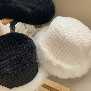 Winter plush faux fur fisherman hat with woven top and thick ear protection for women
