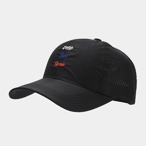 Detail of black marathon cap featuring mesh ventilation and multi-color embroidery