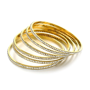 Luxurious layered gold stainless steel bracelets with micro-paved white zircons on white base