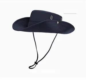 Detail of navy blue hiking hat with adjustable windproof cord and breathable metal vents