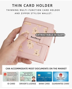 Pink PU leather wallet detail showing a removable ID slot and cute bear print