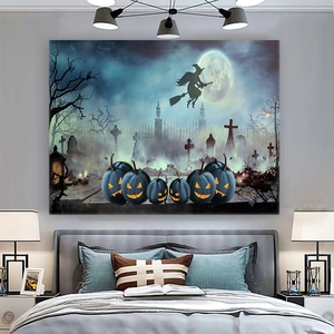Detail of Halloween tapestry with witch and pumpkins hanging on a bedroom wall