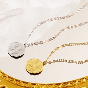Music themed guitar string yin yang pendant necklace in gold and silver finish