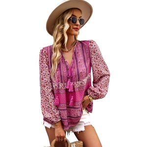 Bohemian floral print V-neck blouse with tassel ties and long puff sleeves for women