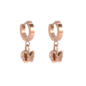 Detail of rose gold butterfly earrings with frosted texture wings and zircon crystals