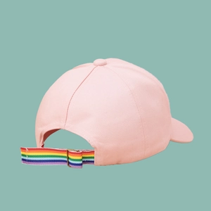 Detailed back view of pink baseball cap featuring rainbow adjustable strap and metal buckle