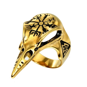 Golden Viking bird skull ring with Vegvisir compass and Valknut symbols on white background