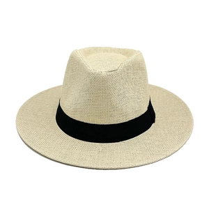 Elegant cream Panama straw hat with a black grosgrain ribbon for summer sun protection