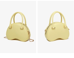Detail of light yellow crescent PVC jelly bag with detachable gold chain strap