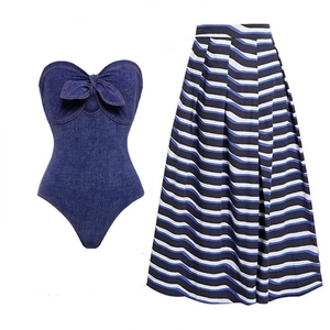 Two-piece denim strapless bodysuit with bow and high-waist pleated wave pattern skirt