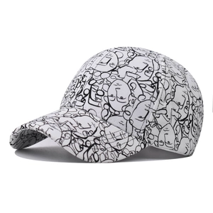Detailed side view of white cotton baseball cap with artistic black face line art graffiti
