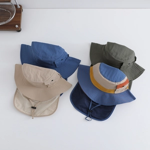 Detail of colorful quick-dry sun hats with neck flaps and adjustable chin straps