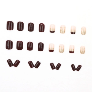 Short square press-on nails in burgundy and pink with golden glitter gradient design