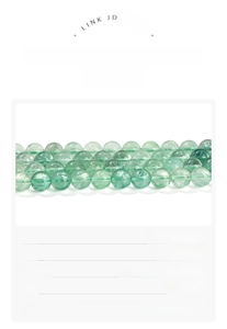 Detail of 6-10mm natural green fluorite round beads with translucent icy texture
