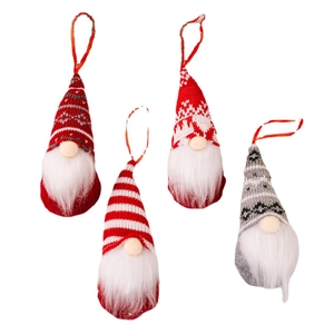 Set of four handmade Christmas gnome ornaments with knitted hats for holiday tree decor