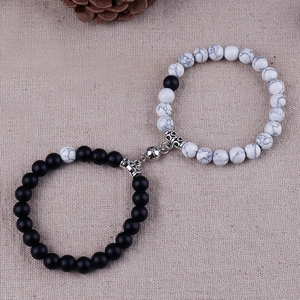 Detail of 8mm black matte and white marble stone beads with magnetic heart clasp