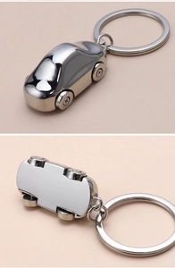 Detailed views of polished silver metal F1 racing car keychain with realistic tire details