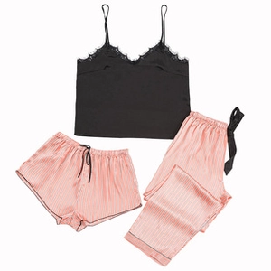 Detailed view of women's 5-piece pajama set featuring black lace camisole and pink striped pants