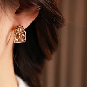 Vintage U-shape hoop earrings with champagne crystal pavé in a rose gold finish