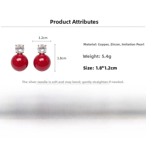 Detail showing red pearl bow earrings made of copper and zircon, 1.8x1.2cm size