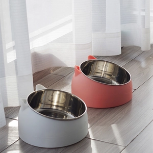 Tilted stainless steel cat bowls with neck protection in white and orange colors