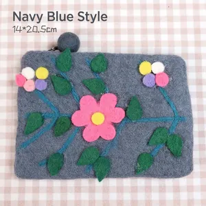 Handmade wool felt organizer bag with floral pattern in dark navy, size 14x20.5cm