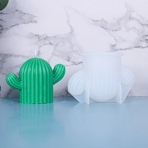 Detail of green cactus candle with textured ridges and its translucent silicone mold