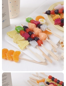 Macro detail of realistic mixed fruit tanghulu skewers with glossy syrup texture