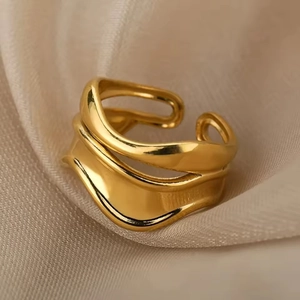 Minimalist 18K gold plated stainless steel irregular wavy open ring on silk fabric