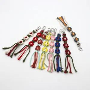 Handmade bohemian crochet flower keychain with cotton fringe tassel and silver lobster clasp