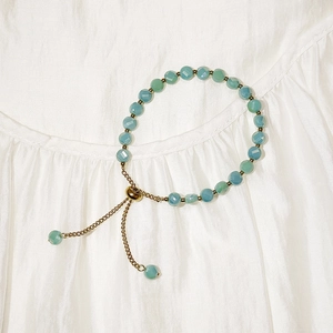 Waterproof crystal faceted bead bracelet in mint blue with adjustable gold pull chain