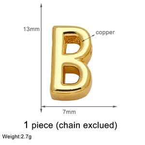 Macro view of 13mm gold plated letter B charm pendant in copper material