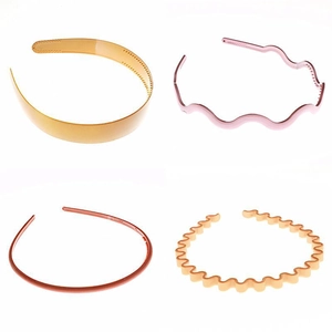 Set of four glossy wavy and smooth plastic headbands in yellow, pink, brown, and beige