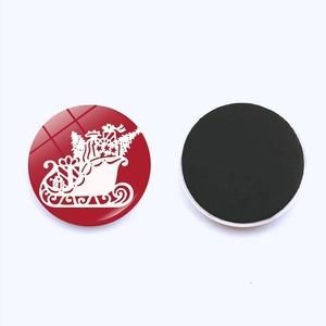 Detailed front and back view of red glass Christmas magnets with Santa sleigh silhouette
