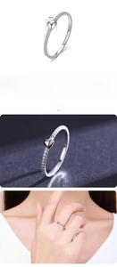 Detail view of S925 sterling silver heart ring with pavé diamonds and 4mm width