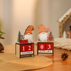 Close-up of wooden DIY Christmas countdown calendar with gnome and date block details