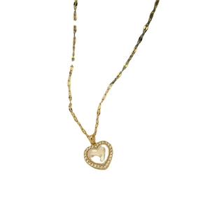 Elegant gold titanium steel necklace with a heart pendant featuring a pearl and crystals
