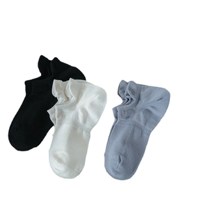 Three-pair set of breathable cotton low-cut socks in black, white, and grey solid colors