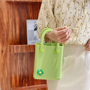 Minimalist grass green EVA tote bag with cute floral DIY charms for beach and summer