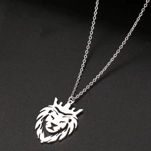 Titanium steel lion head crown pendant necklace with silver O-chain on black background