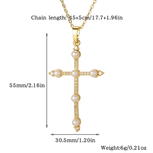 Detailed view of gold cross necklace with pearls and zircon showing size measurements